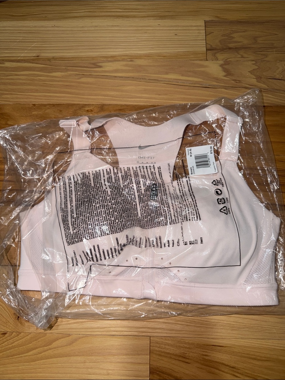 NWT Nike Women’s Light Pink Sports Bra with Front Zip